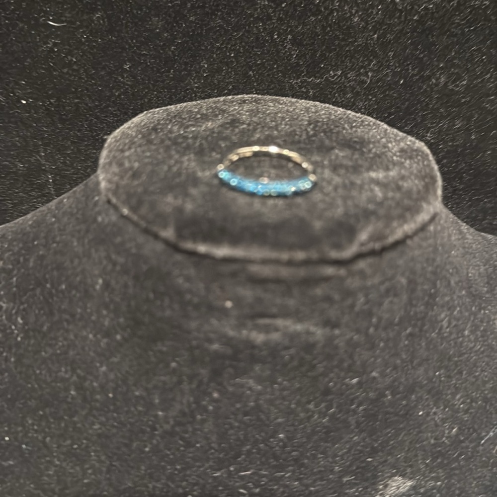 Affinity blue crystal ring. Size 6. New in box.